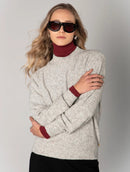 Blusa de gola média com mangas de cava posta aBenção