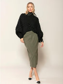 Casaco em ponto bombom com manga bufante e fechamento por botão Biamar