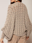 Casaco em ponto bombom com manga bufante e fechamento por botão Biamar