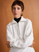 Blusa unissex alongada com zíper na gola e mangas em moletom Biamar