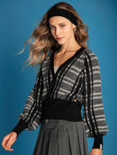 Casaco com padronagem em listras, botões e mangas de cava raglan aBenção