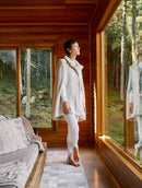 Capa com gola em pele fake e fechamento em botões Biamar