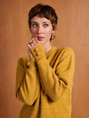 Blusa alongada de gola redonda com detalhe em botões e mangas de cava posta Biamar