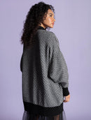 Casaco alongado com padronagem em listras e mangas de cava quadrada Biamar