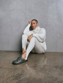 Blusa alongada canelada com gola transpassada e detalhe em alamar Biamar