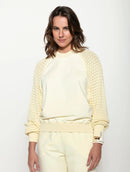 Blusa em algodão com gola redonda e mangas em ponto pipoca de cava raglan Biamar