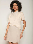 Blusa manga curta em algodão com gola polo e abertura nas costas Biamar