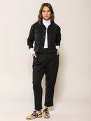 Calça com pregas, bolsos e barra dobrada Biamar