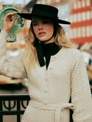 Macacão com tecimento em tranças, cinto e fechamento frontal Biamar