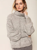 Blusa com gola alta e ampla, pontos vazados e mangas de cava quadrada Biamar