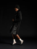 Casaco alongado com recortes e detalhes em suede, tricô e pele fake Biamar