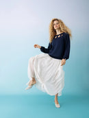 Blusa em algodão com detalhe em recorte, gola redonda e mangas de cava raglan Biamar