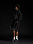 Casaco alongado com recortes e detalhes em suede, tricô e pele fake Biamar