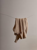 Blusa alongada canelada com gola transpassada e detalhe em alamar Biamar