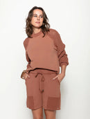 Blusa em algodão com gola redonda e mangas em ponto pipoca de cava raglan Biamar