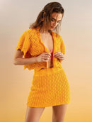 Colete em algodão com pontos vazados e barra ondulada Urbanity