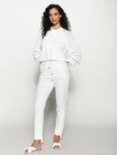 Blusa em algodão com gola redonda e mangas em ponto pipoca de cava raglan Biamar