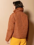 Jaqueta reversível com pele fake, bolsos e mangas de cava posta Biamar