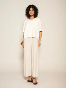 Blusa assimétrica com detalhe de tecido e botões Biamar