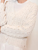 Casaco em pontos vazados com botões e acabamento ondulado Biamar