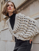 Casaco em ponto bolha com fechamento em botão Biamar