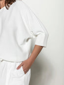 Blusa em algodão com detalhes em ponto pipoca e gola redonda Biamar