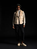 Casaco com recortes e detalhes em suede, tricô e pele fake Biamar