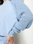 Blusa em algodão com gola redonda e mangas em ponto pipoca de cava raglan Biamar