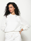 Blusa em algodão com gola redonda e mangas em ponto pipoca de cava raglan Biamar