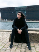 Macacão com tecimento em tranças, cinto e fechamento frontal Biamar