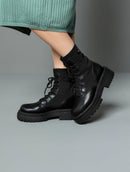 Coturno new york de cano médio e solado tratorado Biamar