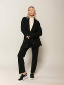 Calça reta canelada com bolsos faca Biamar