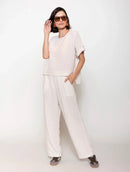 Blusa mullet com padronagem em listras, gola redonda e manga curta dobrada Biamar