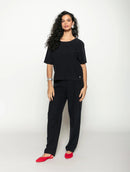 Calça reta com bolsos e botões Biamar