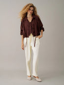 Jaqueta com botões, bolsos e detalhe em elástico Biamar