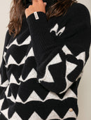 Blusa em padronagem geométrica com gola rolê e mangas da cava quadrada Biamar