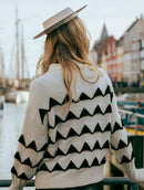 Blusa em padronagem geométrica com gola rolê e mangas da cava quadrada Biamar