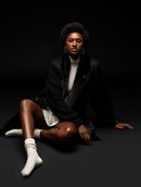 Casaco alongado com recortes e detalhes em suede, tricô e pele fake Biamar