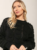 Blusa em pontos vazados com gola redonda e mangas de cava raglan Biamar