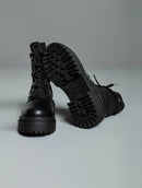 Coturno new york de cano médio e solado tratorado Biamar