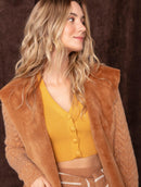 Casaco com tecimento em tranças e pele fake com capuz e sem fechamento frontal Biamar