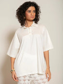 Blusa manga curta de gola polo com detalhe em tecido Biamar